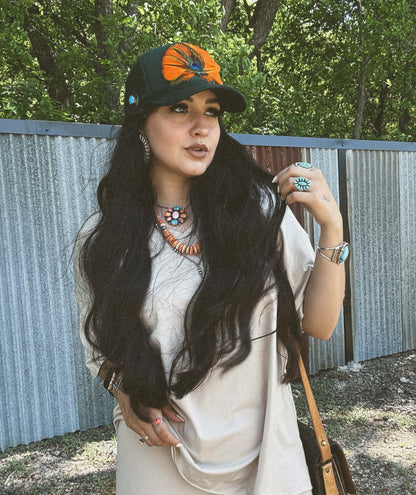 Gabriella’s Feathered Trucker Hat