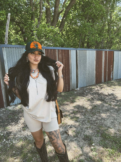 Gabriella’s Feathered Trucker Hat